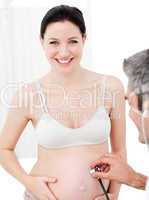 Doctor examining a pregnant woman