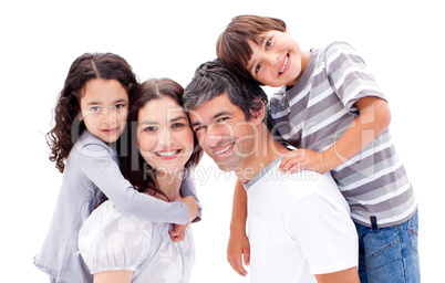 Smiling parents and their children