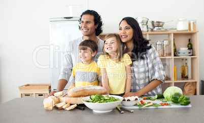 family having fun in the kitchen