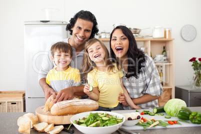 family having fun in the kitchen