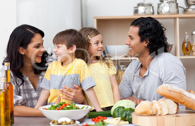 family having fun in the kitchen