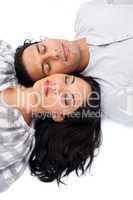 Intimate couple lying on the floor