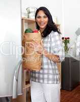 woman unpacking grocery bag