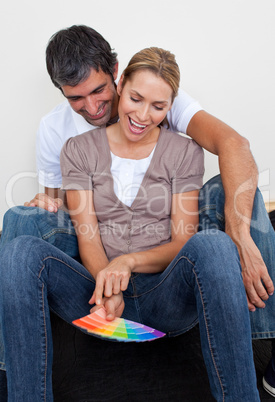 Loving lovers decorating their new house