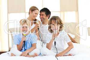 Affectionate family singing together