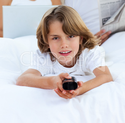 Cute little boy watching TV