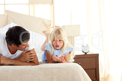 Attentive father talking with his daughter