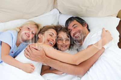 Animated family hugging in the bedroom