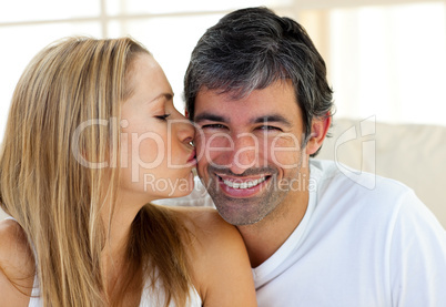 Close-up of woman kissing her boyfriend