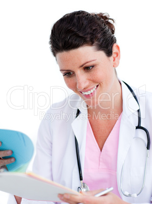 Positive nurse reading paper