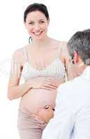 Pregnant woman examining by gynecologist