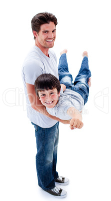 Adorable little boy carried by his father