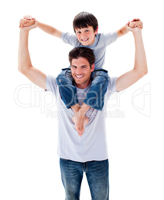 Positive father giving his son piggyback ride
