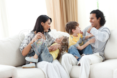 Merry family playing in the living room