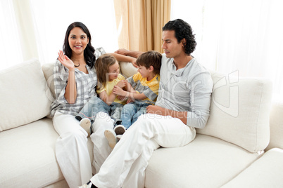 Merry family having fun in the living room