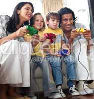 Lively family playing video game