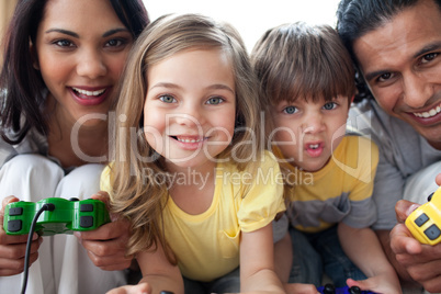 Close-up of family playing video game