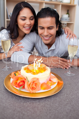 Charming man and his wife celebrating his birthday