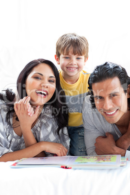 Jolly family reading book together