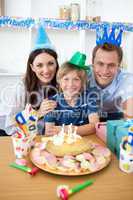 Happy little boy celebrating his birthday