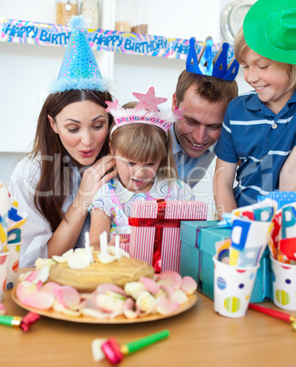 Cheerful little girl celebrating her birthday
