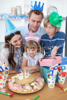 Happy little girl celebrating her birthday