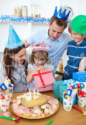 Smiling little girl celebrating her birthday