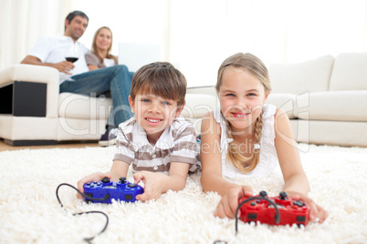 Brother and sister playing video games