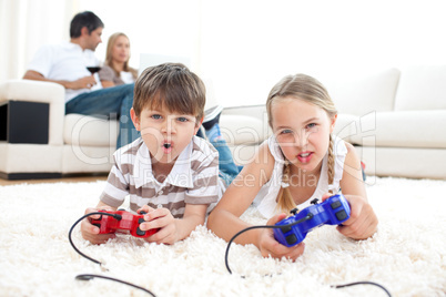 Lively children playing video games