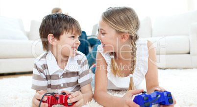 Close-up of children playing video games