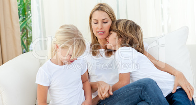 Blond mother having fun with her children