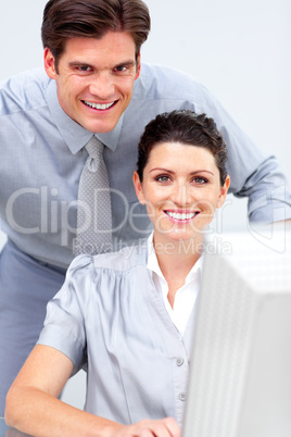 Business people working at a computer