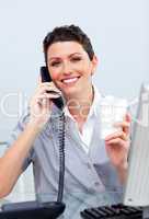 Cheerful business woman on phone