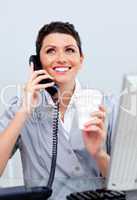 Enthusiastic business woman on phone