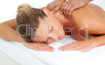 Smiling woman having a massage