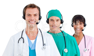 Smiling medical team using headsets