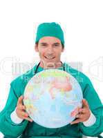 Confident doctor holding terrestrial globe