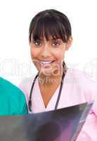 Etnic nurse looking at X-ray