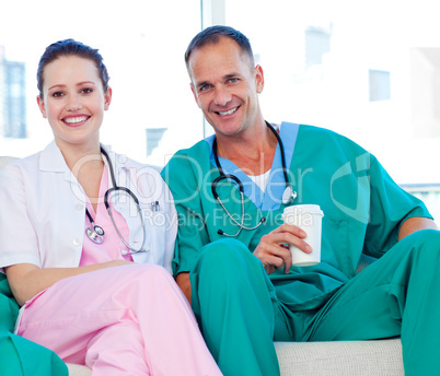 Two doctors relaxing in the staff room