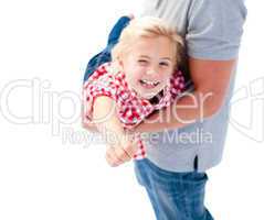 Close-up of little girl enjoying piggyback ride with her father