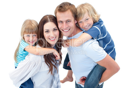 Portrait of family enjoying piggyback ride