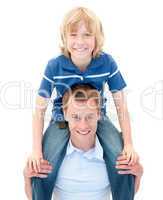 Close-up of  father giving his son piggyback ride