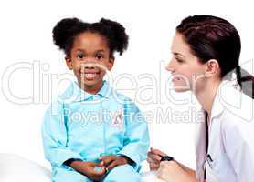 Cute little girl attending medical check-up