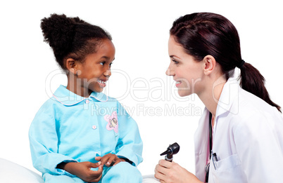Smiling little girl attending medical check-up