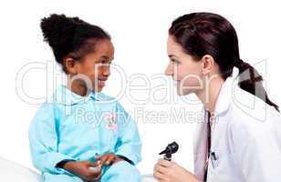 Smiling little girl attending medical check-up