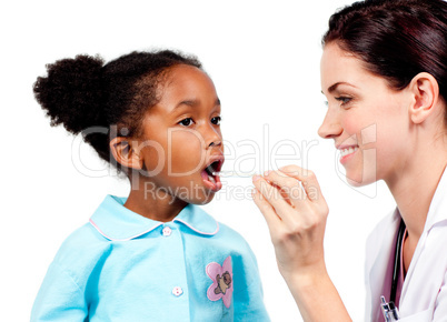 Smiling doctor taking little girl's temperature