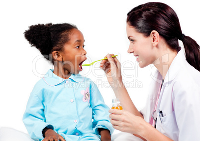 Female doctor giving medicine to her patient
