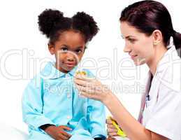Confident doctor giving medicine to her patient