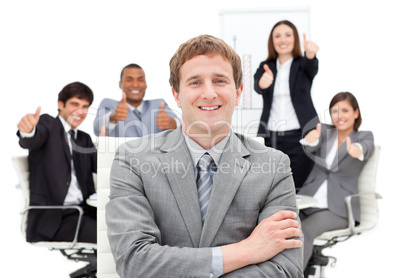International business people with thumbs up