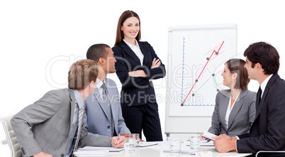 Smiling businesswoman giving a presentation